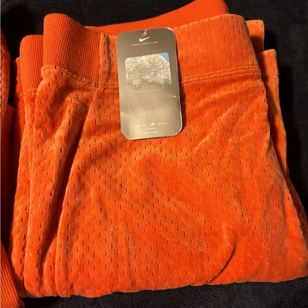 Brand New Women’s Nike Orange Jumpsuit or tracksuit